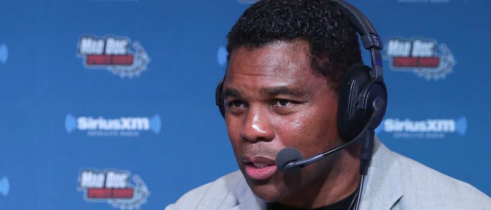 Former NFL player Herschel Walker visits the SiriusXM set at Super Bowl LI Radio Row at the George R. Brown Convention Center on February 3, 2017 in Houston, Texas. (Photo by Cindy Ord/Getty Images for SiriusXM )