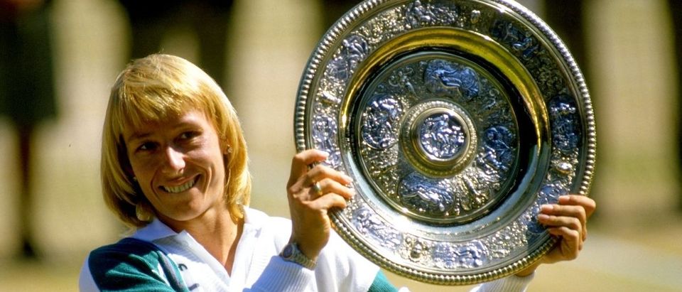Jul 1987: Martina Navratilova of the USA holds up the winner plate after winning the Wimbledon Championships played at Wimbledon, London, England. Mandatory Credit: Allsport UK /Allsport/ Getty Images