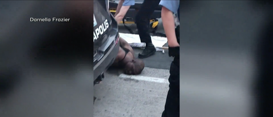George Floyd being removed, completely limp, from the scene of his arrest