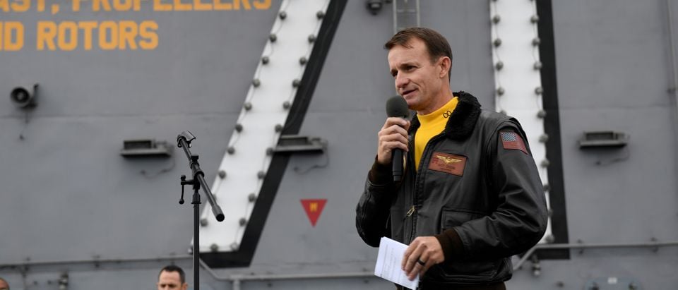 Captain Brett Crozier, commanding officer of the U.S. Navy aircraft carrier USS Theodore Roosevelt, speaks at sea
