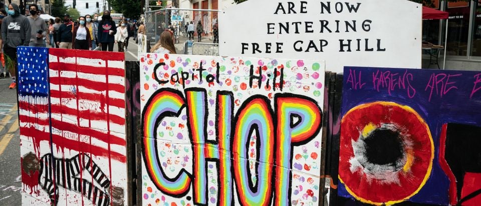 A signs reads "Capitol Hill Occupied Protest" in area that has been referred to by protesters by that name as well as "Capitol Hill Organized Protest, or CHOP, on June 14, 2020 in Seattle, Washington. (David Ryder/Getty Images)