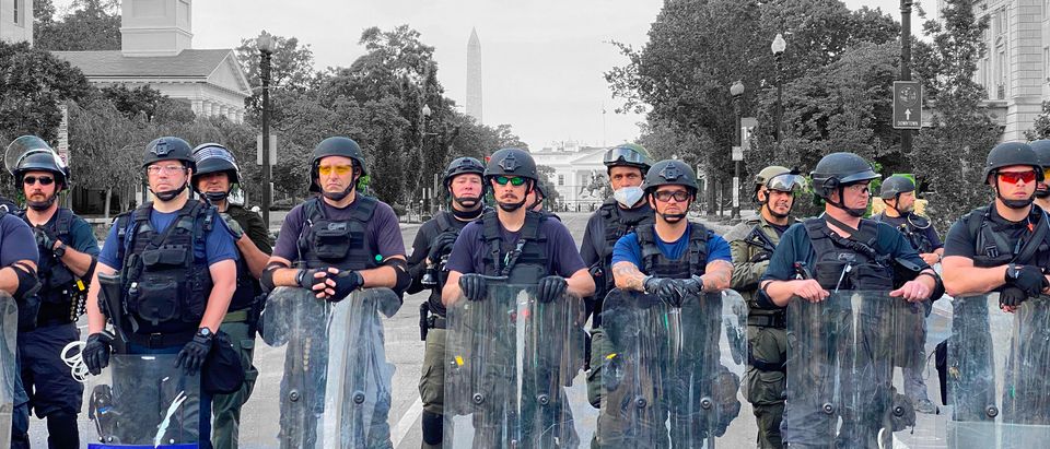 Police lined up during protests in Washington, D.C. (Daily Caller)