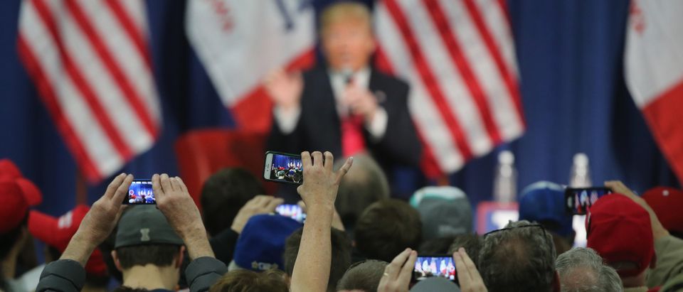 COUNCIL BLUFFS, IA - JANUARY 31: People photograph Republican presidential candidate Donald Trump with their smart phones as he speaks to guests during a campaign rally at the Gerald W. Kirn Middle School on January 31, 2016 in Council Bluffs, Iowa. Trump and other presidential hopefuls are in Iowa trying to gain support and crucial votes for tomorrow's caucuses. (Photo by Christopher Furlong/Getty Images)
