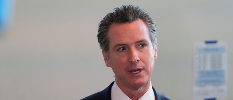 California's Governor Gavin Newsom speaks to the media after casting his vote at a voting center at The California Museum for the presidential primaries on Super Tuesday in Sacramento