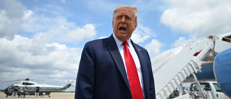 US President Donald Trump speaks to the press before boarding Air Force One at Joint Base Andrews in Maryland on August 6, 2020. - Trumps travels to Clyde, Ohio, to speak at a Whirlpool Corporation Manufacturing Plant. (Photo by JIM WATSON/AFP via Getty Images)