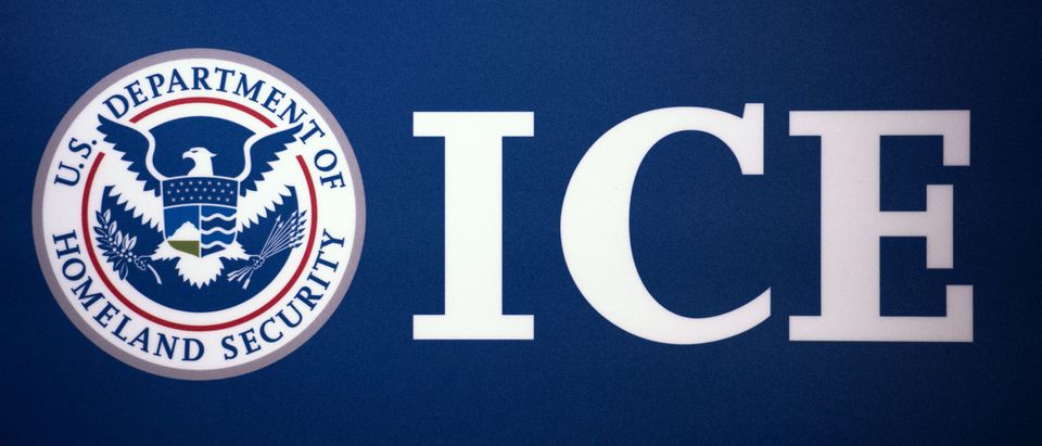 The Immigration and Customs Enforcement (ICE) seal is seen before a press conference discussing ongoing enforcement efforts to combat human smuggling along the Southwest border of the United States, July 22, 2014 at ICE headquarters in Washington, DC. AFP Photo/Paul J. Richards (PAUL J. RICHARDS/AFP via Getty Images)