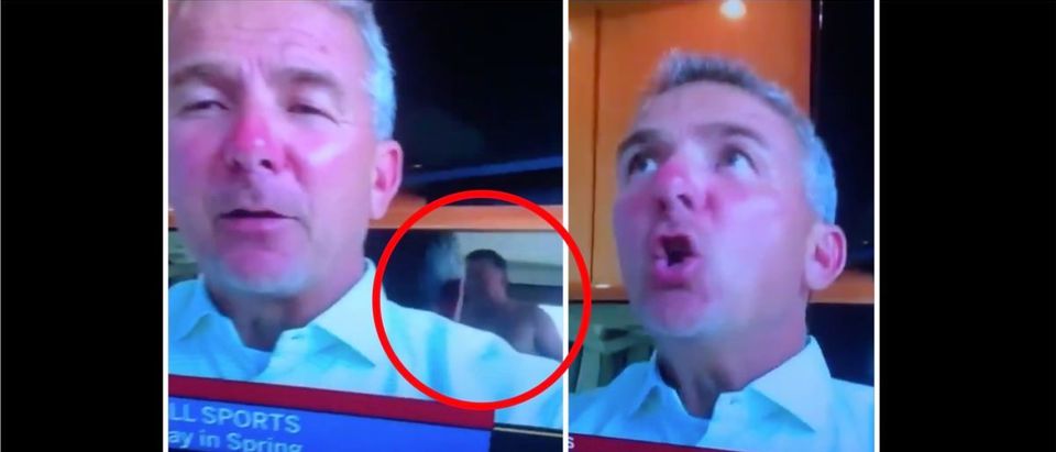 Urban Meyer Frantically Waves Off Shirtless Man During Live TV Interview |  The Daily Caller