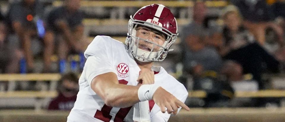 Sep 26, 2020; Columbia, Missouri, USA; Alabama Crimson Tide quarterback Mac Jones (10) throws a pass for a touchdown against the Missouri Tigers during the first half at Faurot Field at Memorial Stadium. Mandatory Credit: Denny Medley-USA TODAY Sports via Reuters