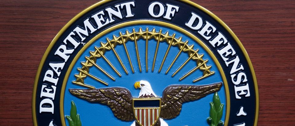 The US Department of Defense(DOD) seal is seen on the lecturn in the media briefing room at the Pentagon December 12, 2013 in Washington, DC. (PAUL J. RICHARDS/AFP via Getty Images)