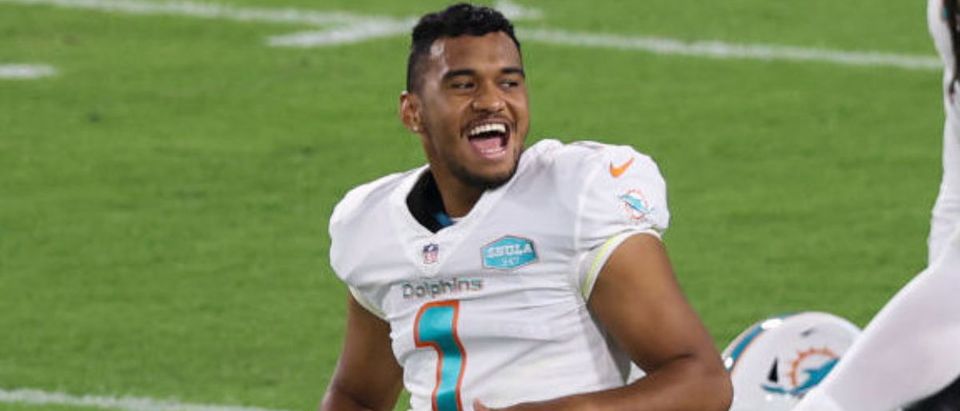 JACKSONVILLE, FLORIDA - SEPTEMBER 24: Tua Tagovailoa #1 of the Miami Dolphins looks on before the start of the game against the Jacksonville Jaguars at TIAA Bank Field on September 24, 2020 in Jacksonville, Florida. (Photo by James Gilbert/Getty Images)