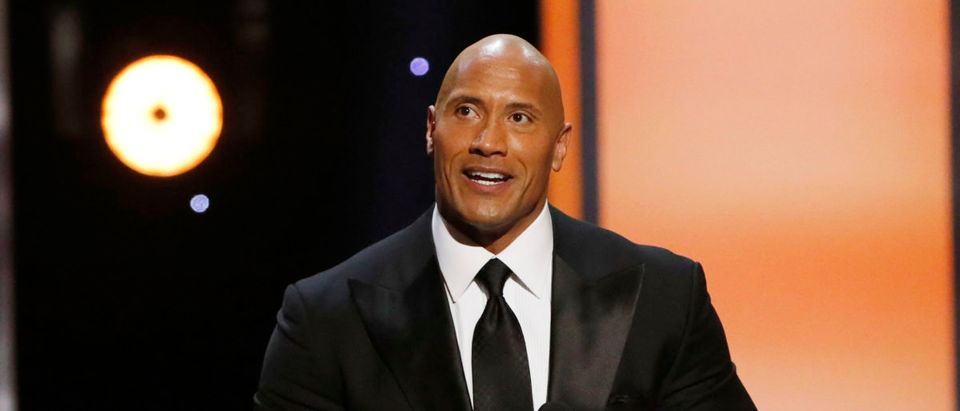 Dwayne Johnson accepts the Entertainer of the Year award during the 48th NAACP Image Awards in Pasadena