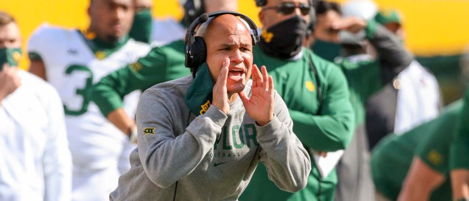 Oct 3, 2020; Morgantown, West Virginia, USA; Baylor Bears head coach Dave Aranda yells from the sidelines during the third quarter against the West Virginia Mountaineers at Mountaineer Field at Milan Puskar Stadium. Mandatory Credit: Ben Queen-USA TODAY Sports via Reuters