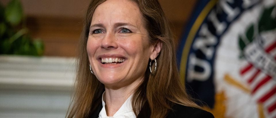WASHINGTON, DC - OCTOBER 1: Seventh U.S. Circuit Court Judge Amy Coney Barrett, President Trump's pick for the Supreme Court, meets with Sen. Roger Wicker (R-MS) in the Mansfield Room of the U.S. Capitol on October 1, 2020 in Washington, DC. Barrett is meeting with senators ahead of her confirmation hearing on October 12, less than a month before the general election. (Graeme Jennings-Pool/Getty Images)