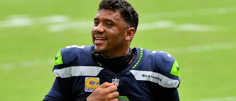 Oct 4, 2020; Miami Gardens, Florida, USA; Seattle Seahawks quarterback Russell Wilson (3) celebrates with the fans after defeating the Miami Dolphins at Hard Rock Stadium. Mandatory Credit: Jasen Vinlove-USA TODAY Sports via Reuters