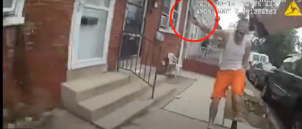 Ricardo Muñoz chases an unidentified Lancaster Police Officer with a knife on Sept. 13 before being fatally shot. (Screenshot/Youtube PennLive.com)