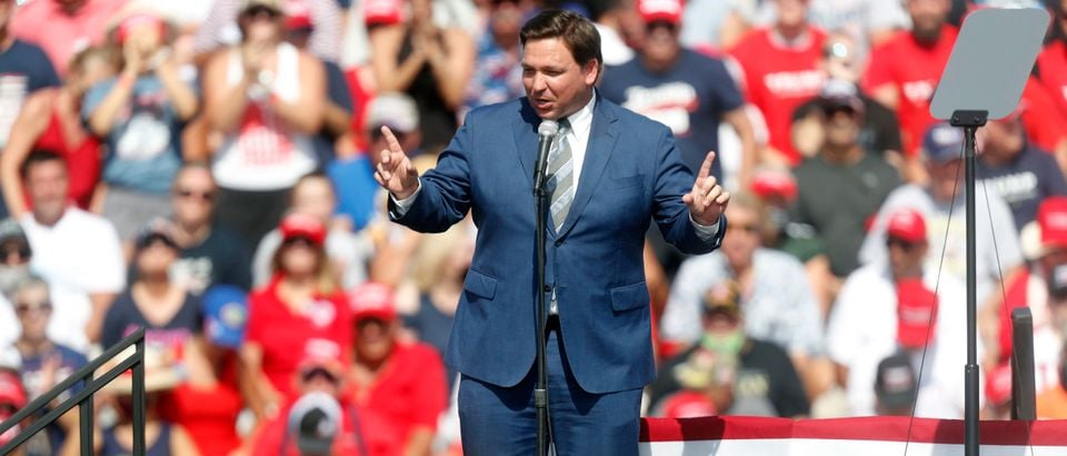 TAMPA, FL - OCTOBER 29: Florida Governor Ron DeSantis speaks to supporters of President Donald Trump before he arrives to give a campaign speech just four days before Election Day outside of Raymond James Stadium on October 29, 2020 in Tampa, Florida. With less than a week until Election Day, Trump and his opponent, Democratic presidential nominee Joe Biden, are campaigning across the country. (Octavio Jones/Getty Images)