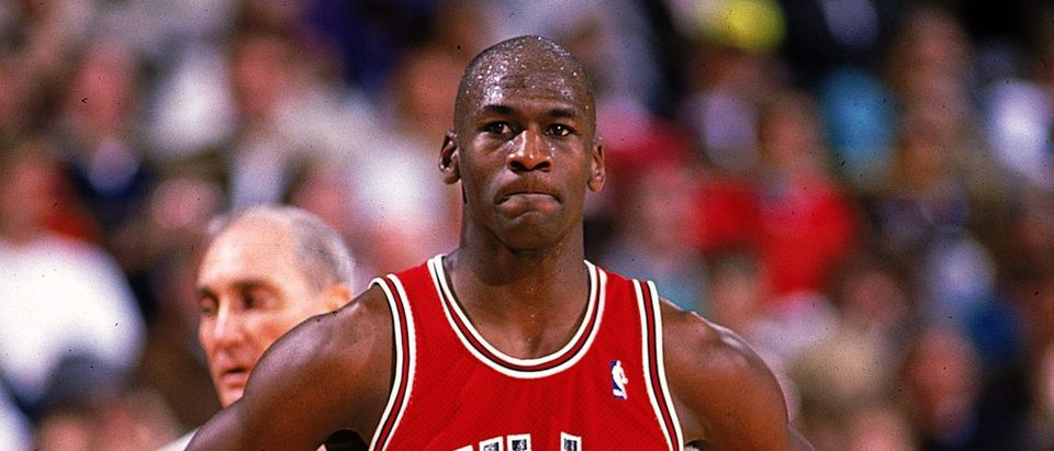 Michael Jordan #23 of the Chicago Bulls looks on during the game. Mandatory Credit: Ken Levine /Allsport/ Getty Images