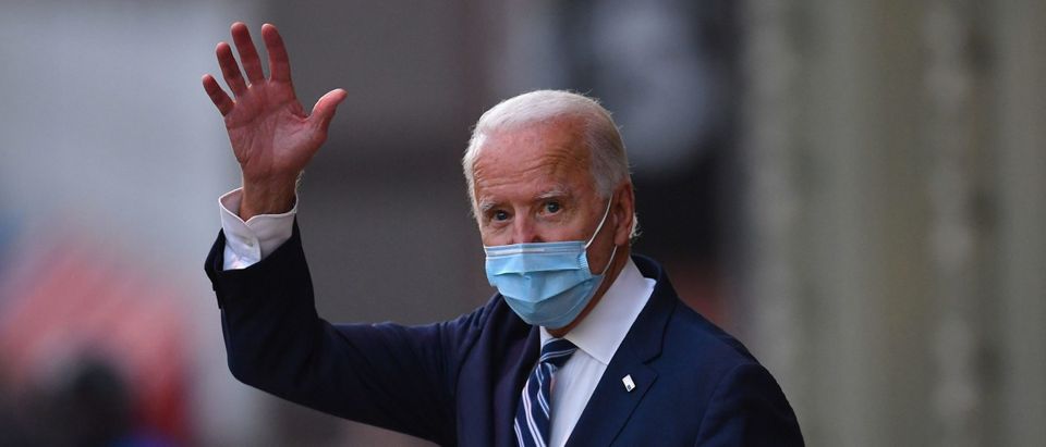 US President-elect Joe Biden waves as he leaves The Queen in Wilmington, Delaware, on November 10, 2020. - President-elect Joe Biden said November 10, 2020 he had told several world leaders that "America is back" after his defeat of Donald Trump in last week's bitterly contested US election. (Photo by Angela Weiss / AFP) (Photo by ANGELA WEISS/AFP via Getty Images)