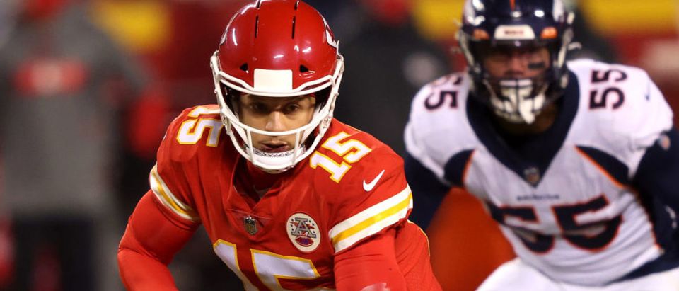KANSAS CITY, MISSOURI - DECEMBER 06: Patrick Mahomes #15 of the Kansas City Chiefs scrambles during the second quarter of a game against the Denver Broncos at Arrowhead Stadium on December 06, 2020 in Kansas City, Missouri. (Photo by Jamie Squire/Getty Images)