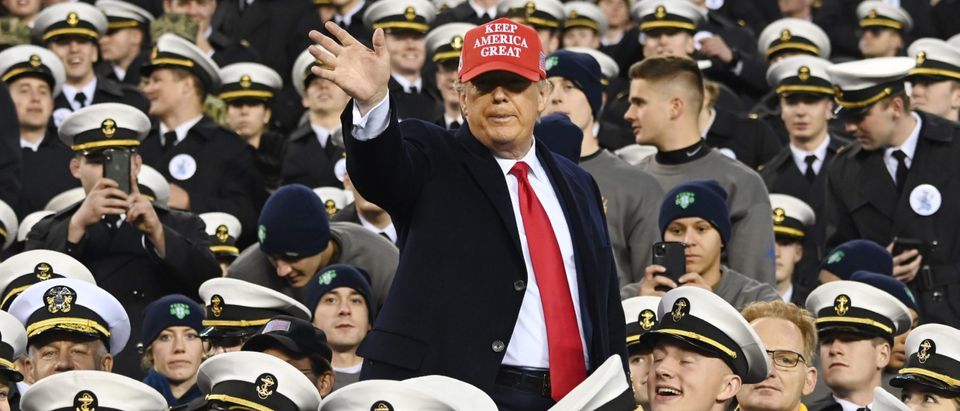 US President Donald Trump joins Naval Academy cadets during the the Army v. Navy American Football game in Philadelphia on December 14, 2019. (Photo by ANDREW CABALLERO-REYNOLDS/AFP via Getty Images)