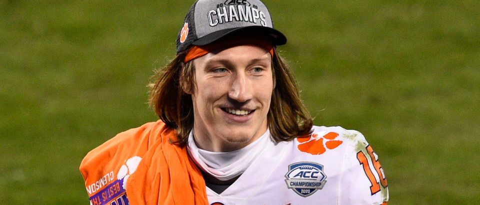 Dec 19, 2020; Charlotte, NC, USA; Clemson Tigers quarterback Trevor Lawrence (16) on the field after winning the ACC Football Championship at Bank of America Stadium. Mandatory Credit: Bob Donnan-USA TODAY Sports via Reuters