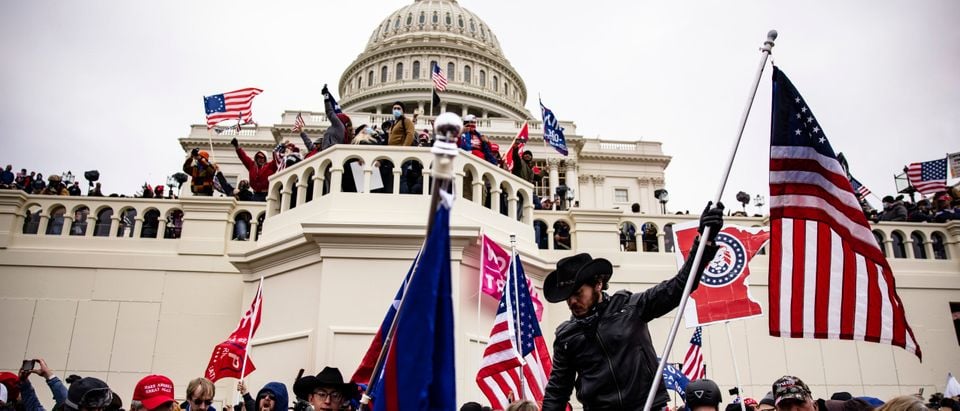 Pro-Trump supporters storm the U.S. Capitol following a rally with President Donald Trump on January 6, 2021 in Washington, DC. (Samuel Corum/Getty Images)