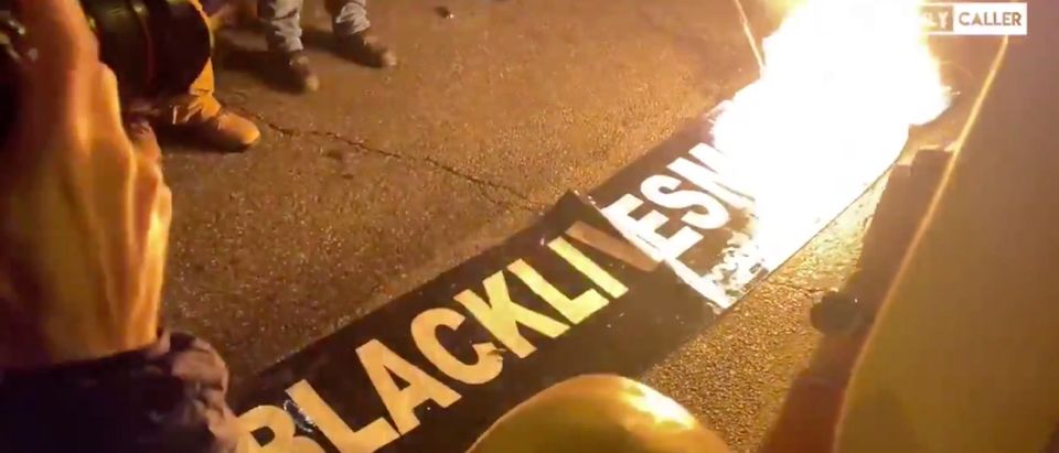 Proud Boys burn a Black Lives Matter banner in DC (Screenshot-Shelby Talcott)