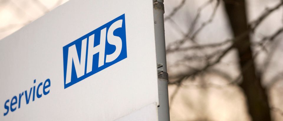 A National Health Service (NHS) sign is shown February 19, 2003 in London, England.