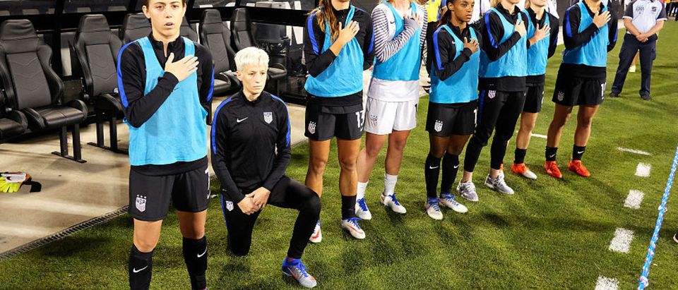 COLUMBUS, OH - SEPTEMBER 15: Megan Rapinoe #15 of the U.S. Women's National Team kneels during the playing of the U.S. National Anthem before a match against Thailand on September 15, 2016 at MAPFRE Stadium in Columbus, Ohio. (Photo by Jamie Sabau/Getty Images)