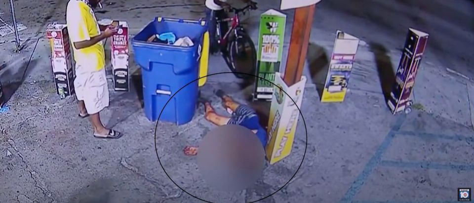 An unidentified 12-year-old boy collapses outside a market in Miami-Dade after being assaulted and shot [Youtube:Screenshot:WPLG Local 10]