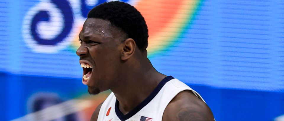 Mar 12, 2021; Indianapolis, Indiana, USA; Illinois Fighting Illini center Kofi Cockburn (21) reacts to dunking the ball against the Rutgers Scarlet Knights in the first half at Lucas Oil Stadium. Mandatory Credit: Aaron Doster-USA TODAY Sports via Reuters