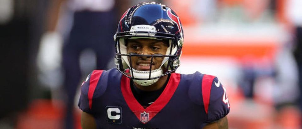 HOUSTON, TEXAS - JANUARY 03: Deshaun Watson #4 of the Houston Texans reacts to a play during the first half against the Tennessee Titans at NRG Stadium on January 03, 2021 in Houston, Texas. (Photo by Carmen Mandato/Getty Images)