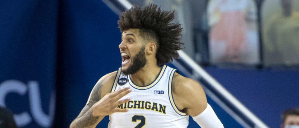 ANN ARBOR, MICHIGAN - FEBRUARY 25: Isaiah Livers #2 of the Michigan Wolverines reacts during the first half against the Iowa Hawkeyes at Crisler Arena on February 25, 2021 in Ann Arbor, Michigan. (Photo by Nic Antaya/Getty Images)