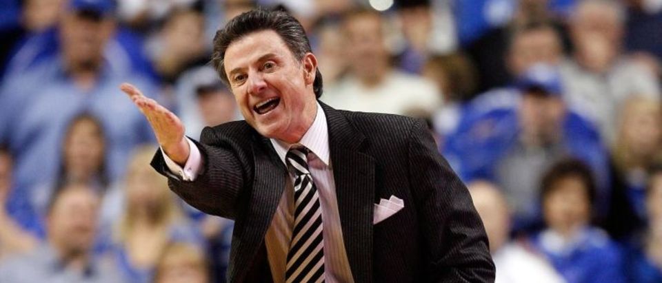 LEXINGTON, KY - JANUARY 02: Rick Pitino the Head Coach of the Louisville Cardinals gives instructions to his team during the game against the Kentucky Wildcats at Rupp Arena on January 2, 2010 in Lexington, Kentucky. Kentucky won 71-62. (Photo by Andy Lyons/Getty Images)
