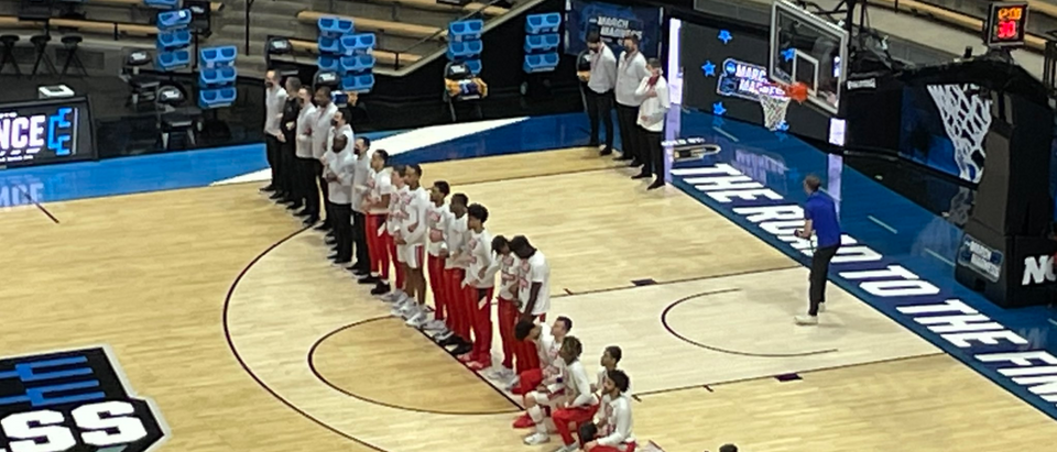 Ohio State players kneel during National Anthem.