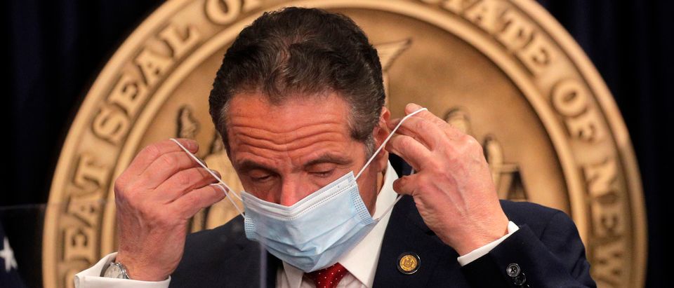 NEW YORK, NEW YORK - MARCH 24: New York Governor Andrew Cuomo puts on his mask after a news conference at his office on March 24, 2021 in New York City. Cuomo gave an update on the state's COVID-19 response and took questions from the media. (Photo by Brendan McDermid-Pool/Getty Images)