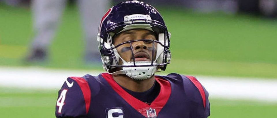 HOUSTON, TEXAS - JANUARY 03: Deshaun Watson #4 of the Houston Texans reacts to a play during a game against the Tennessee Titans at NRG Stadium on January 03, 2021 in Houston, Texas. (Photo by Carmen Mandato/Getty Images)
