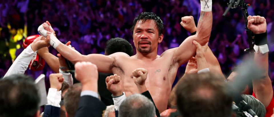 LAS VEGAS, NEVADA - JULY 20: Manny Pacquiao celebrates his split decision victory over Keith Thurman in their WBA welterweight title fight at MGM Grand Garden Arena on July 20, 2019 in Las Vegas, Nevada. (Photo by Steve Marcus/Getty Images)