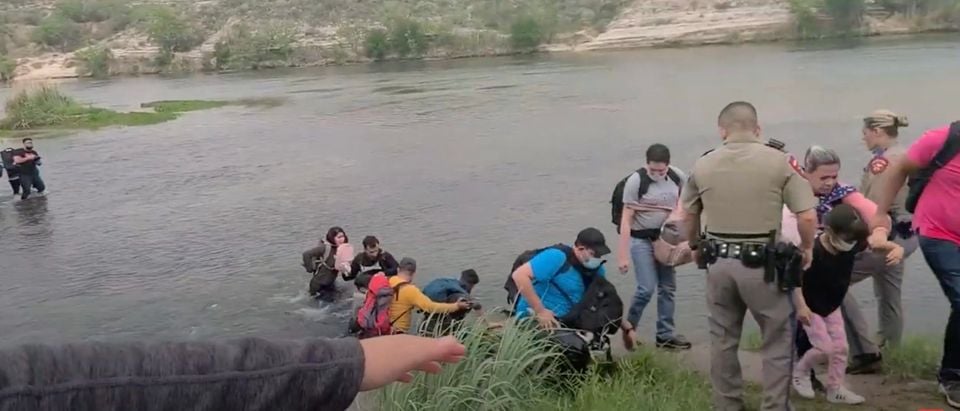 Migrants cross into the U.S., Illegally [Youtube:Screenshot:Daily Caller]