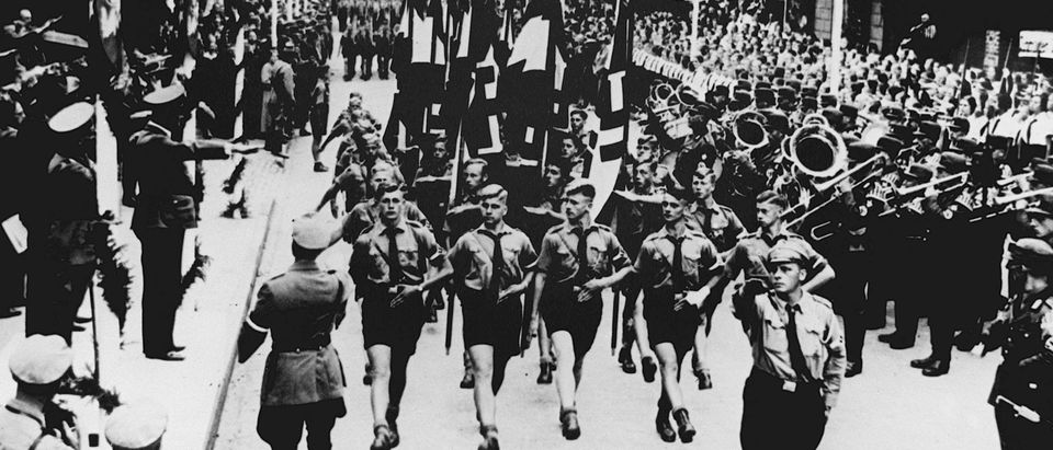 The Hitler Youth parade marches in front of Adolf Hitler. Photo by AFP. Getty.