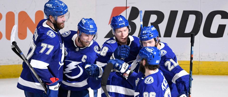 Jun 28, 2021; Tampa, Florida, USA; Tampa Bay Lightning center Steven Stamkos (91) celebrates with teammates after scoring a goal against the Montreal Canadiens in the third period of game one of the 2021 Stanley Cup Final at Amalie Arena. Mandatory Credit: Douglas DeFelice-USA TODAY Sports via Reuters