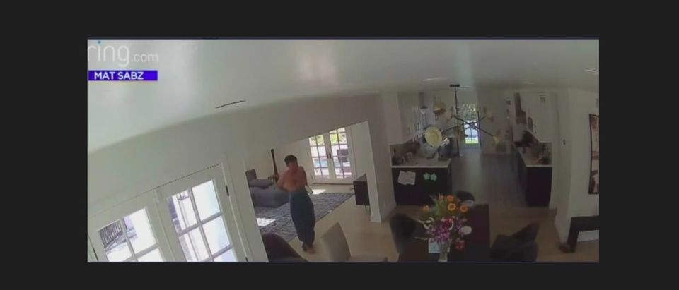 Security camera footage of the intruder posted by CBS Los Angeles on Twitter.