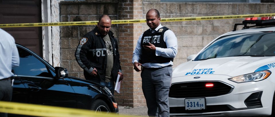 Police investigate the scene of a shooting in Brooklyn on June 23, 2021 in New York City. (Photo by Spencer Platt/Getty Images)