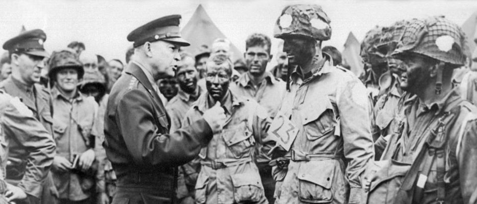 (FILES) - Picture of supreme commander for the 1944 cross-channel invasion of the continental mainland, general Dwight D. Eisenhower giving order of the day to the paratroopers, just before they board their airplane to participate in the first assault in the invasion of the continent of Europe, 06 June 1944, England. (Photo credit: AFP/AFP via Getty Images)