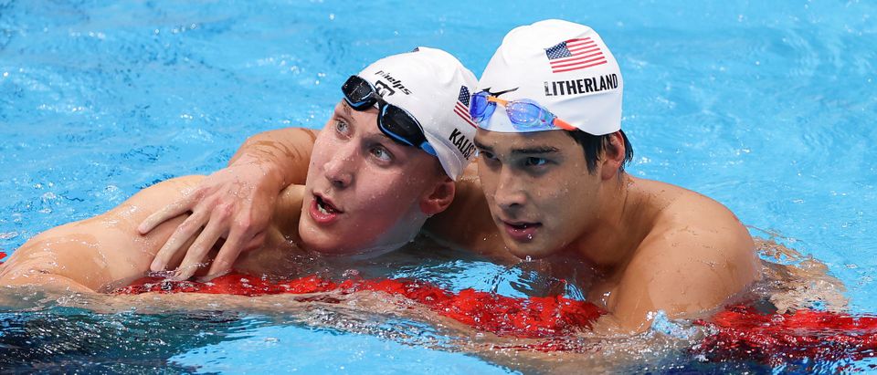 Chase Kalisz (L) of Team United States celebrates winning the gold medal with silver medalist Jay Litherland of Team United States in the Men's 400m Individual Medley Final on day two of the Tokyo 2020 Olympic Games at Tokyo Aquatics Centre on July 25, 2021 in Tokyo, Japan. (Photo by David Ramos/Getty Images)