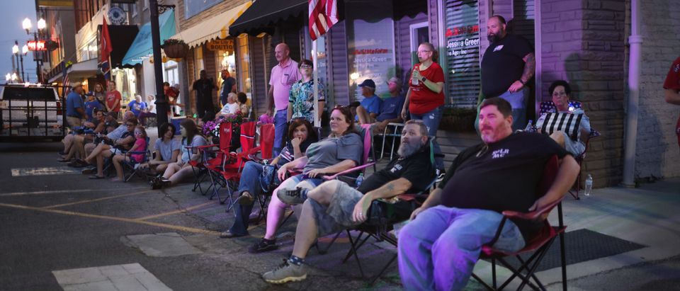People gather along Main Street to watch fireworks while celebrating Independence Day on July 04, 2021 in Sweetwater, Tennessee. (Photo by Scott Olson/Getty Images)