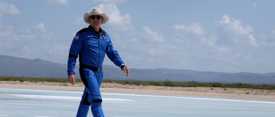 Jeff Bezos walks near Blue Origin’s New Shepard after flying into space on July 20, 2021 in Van Horn, Texas. (Photo by Joe Raedle/Getty Images)