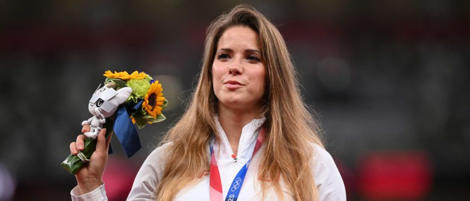 TOKYO, JAPAN - AUGUST 07: Silver medalist Maria Andrejczyk of Team Poland stands on the podium during the medal ceremony for the Women’s Javelin Throw on day fifteen of the Tokyo 2020 Olympic Games at Olympic Stadium on August 07, 2021 in Tokyo, Japan. (Photo by Matthias Hangst/Getty Images)