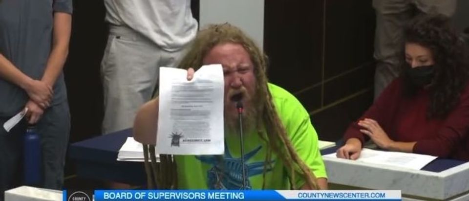 Matt Baker gives a speech in protest of a vaccine mandate at the San Diego County Board Hearing