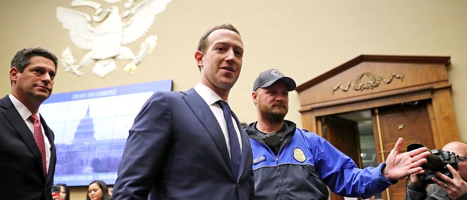 Facebook co-founder, Chairman and CEO Mark Zuckerberg leaves during a break in a hearing of the House Energy and Commerce Committee. (Photo by Chip Somodevilla/Getty Images)